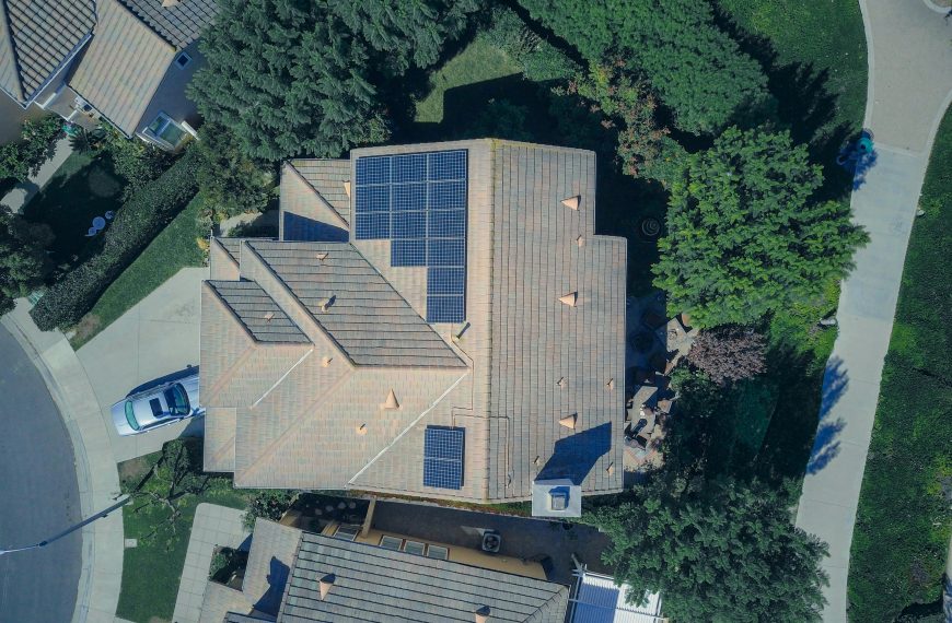 aerial view of roofs with solar panels