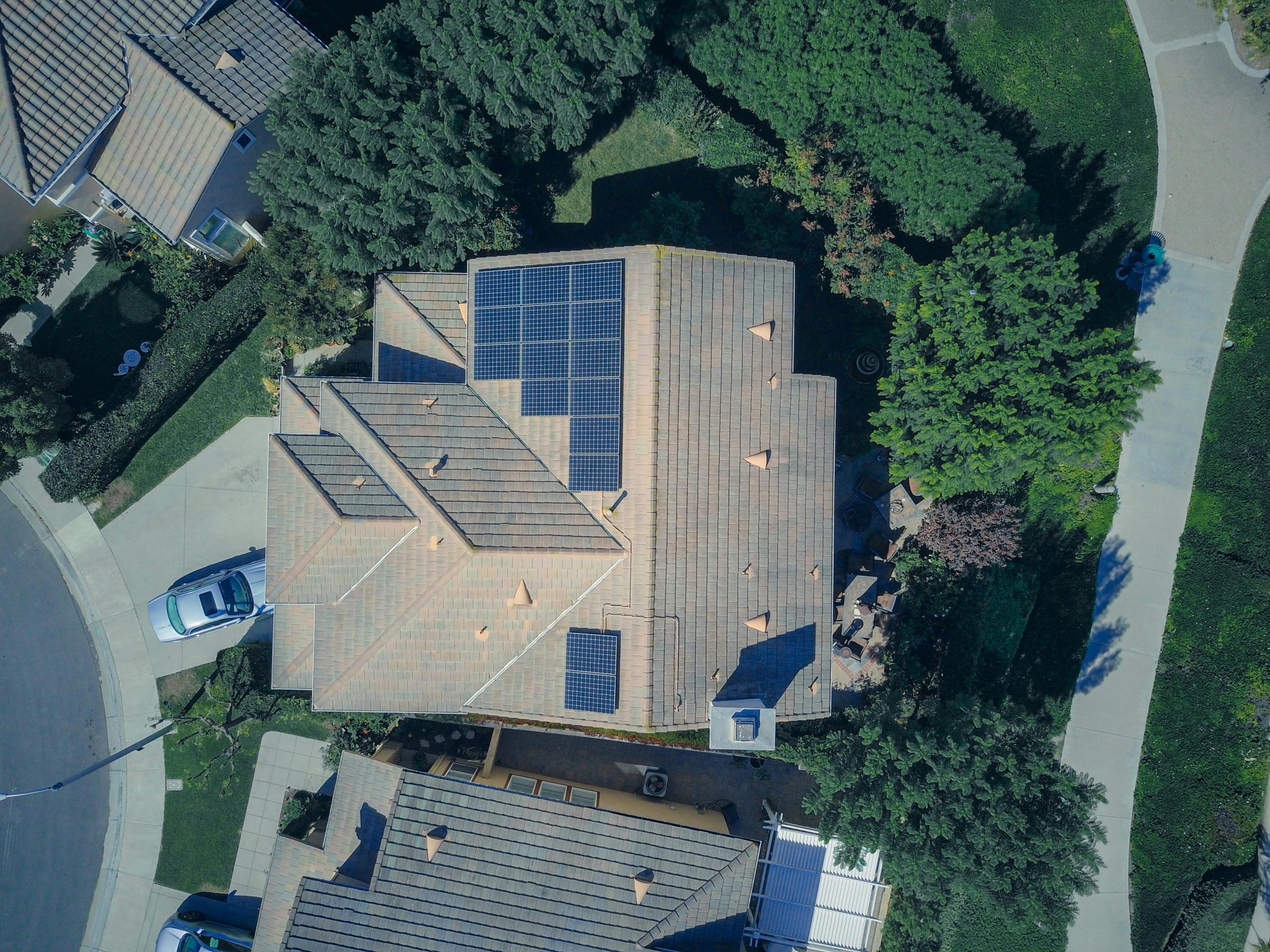 aerial view of roofs with solar panels