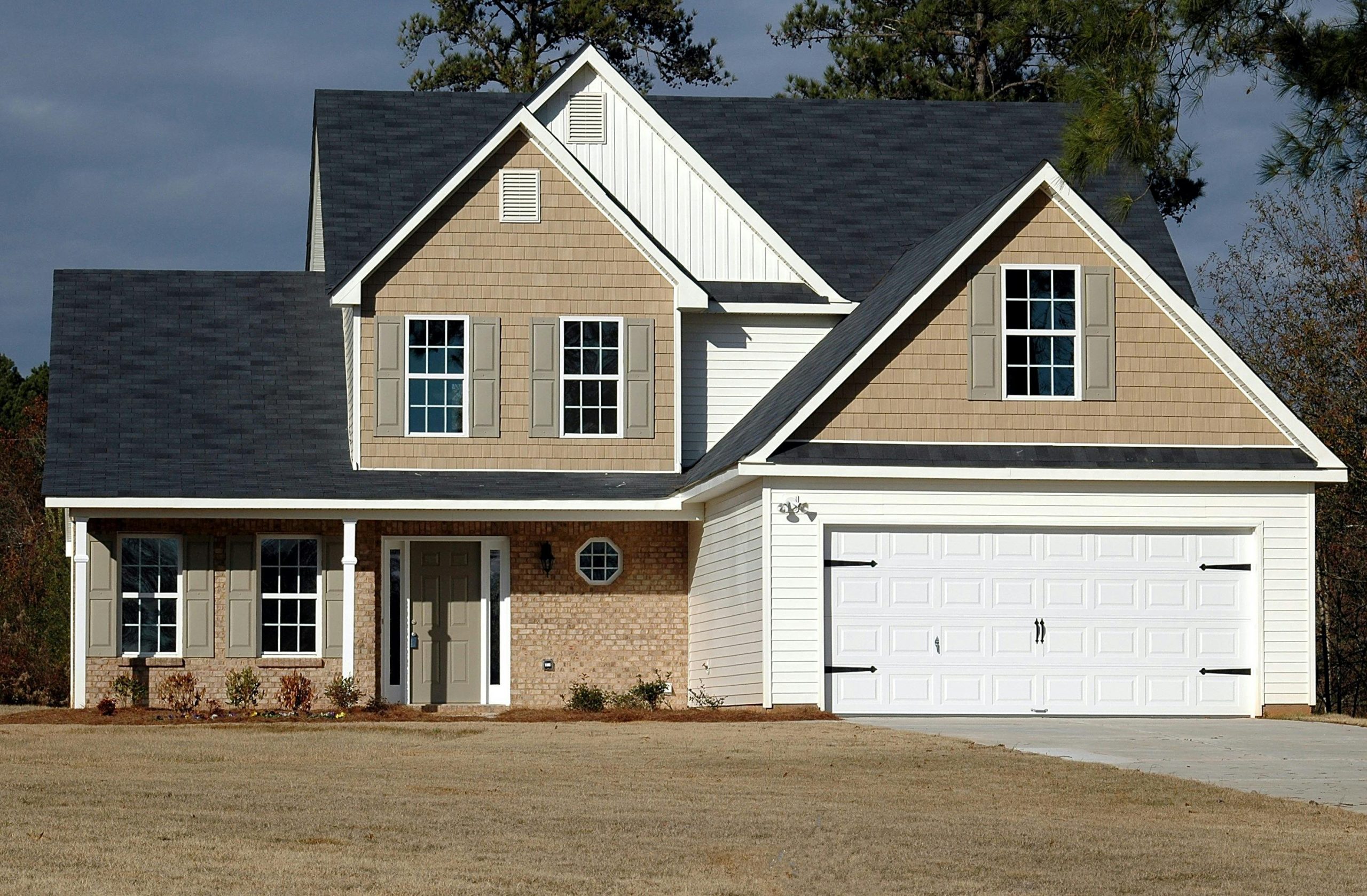 house featuring a gable roof covered in asphalt shingles